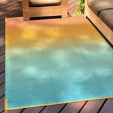 Anidaroel vista frontal alfombra ombre naranja y azul beneficio decorativo
