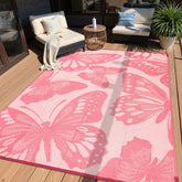 Anidaroel vista frontal de la alfombra rosa mariposa mostrando diseño y tamaño