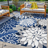 Arenarug alfombra frontal azul con diseño floral que embellece espacios exteriores
