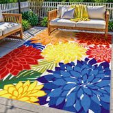 Arenarug vista frontal del paquete mostrando colores vivos y diseño floral, mejora estética del patio