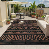 Beeiva alfombra exterior frontal mostrando diseño negro marrón y beneficio estético