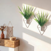 Canlierr macetas colgantes frontales mostrando acabado plateado y plantas artificiales para decoración