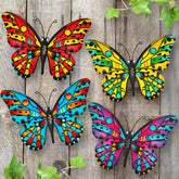 Daogtc mariposa metálica frontal mostrando colores y diseño decorativo