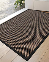 DEXI felpudo frontal 24x36 mostrando forma y color negro, protege entradas