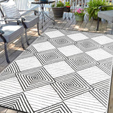 DiiKoo alfombra exterior frontal mostrando patrón reversible y atractivo