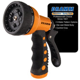 Dramm revolver frontal naranja mostrando forma robusta y agarre ergonómico para comodidad