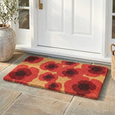 Fab Habitat felpudo frontal Poppies Red mostrando bienvenida y limpieza