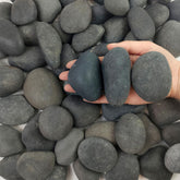 FANTIAN frontal del paquete de piedras negras mostrando cantidad y tamaño