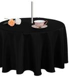 Fitable vista frontal del mantel negro protege y embellece la mesa