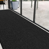 FloorGuard felpudo frontal en entrada mostrando protección del suelo