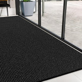 FloorGuard vista frontal mostrando tamaño extragrande y protección de entrada