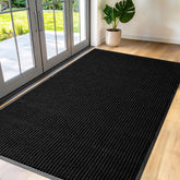 FloorGuard vista frontal del felpudo mostrando tamaño y acabado profesional