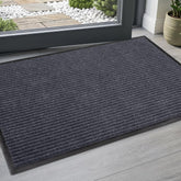 FloorGuard felpudo frontal con diseño gris y beneficio limpieza eficaz