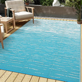 Garvee alfombra exterior frontal mostrando diseño azul elegante y protección