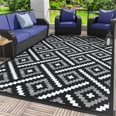 GENIMO alfombra frontal 6'x9' Ink White mostrando patrón reversible y beneficio estético