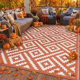 GENIMO alfombra exterior vista frontal con patrón naranja blanco y beneficio estético