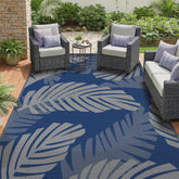 GENIMO alfombra exterior vista frontal con diseño hojas de palma y beneficio estético