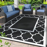 GENIMO alfombra exterior frontal mostrando patrón y tamaño práctico