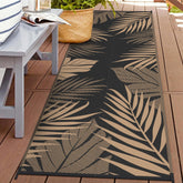 GENIMO alfombra exterior frontal mostrando diseño hojas y protección UV