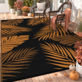 GENIMO alfombra exterior frontal mostrando patrón hojas de palma y colores naranja negro
