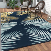 GENIMO alfombra exterior frontal mostrando diseño amarillo y azul marino y beneficio estético