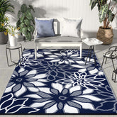 GENIMO alfombra exterior frontal mostrando patrón palm leaf y color zafiro blanco, elegante
