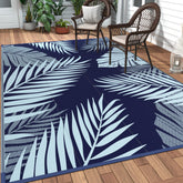 GENIMO alfombra exterior frontal mostrando diseño azul de hojas