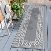 GENIMO alfombra exterior frontal mostrando diseño geométrico y beneficio estético