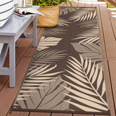 GENIMO alfombra exterior vista frontal con diseño hoja de palma y aspecto acogedor