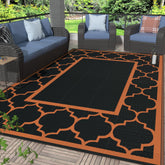 GENIMO alfombra exterior frontal muestra diseño negro naranja y beneficio estético