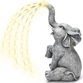 GIGALUMI estatua elefante frontal mostrando diseño adorable y luz ambiental