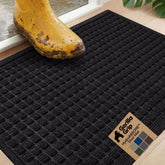 GORILLA GRIP felpudo frontal negro mostrando absorción y aspecto resistente