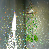 HDCRYSTALGIFTS frontal del suncatcher en su empaque, presentación elegante
