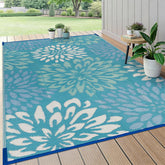 HEBE alfombra exterior frontal mostrando patrón floral y beneficio decorativo