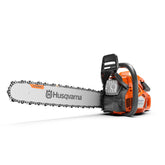 Husqvarna 450X vista frontal mostrando el embalaje y beneficios de rendimiento