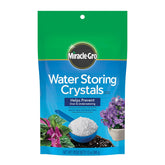 Miracle-Gro envase frontal mostrando 12 oz y usos para riego más fácil