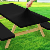 Moosfor vista frontal del mantel ajustado en mesa picnic, acabado elegante