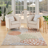 Nourison Aloha vista frontal con flores grandes y colores suaves, aporta estilo