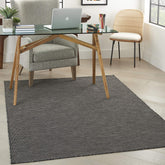Nourison alfombra Positano frontal mostrando color carbón y limpieza fácil