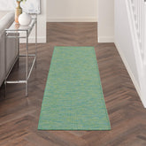 Nourison runner frontal mostrando tonos azul y verde y durabilidad