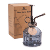 OFFIDIX botella frontal de cristal gris mostrando diseño elegante y práctico