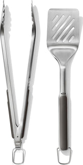 OXO espátula y pinzas frontal mostrando diseño y uso cómodo