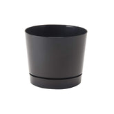 Root & Vessel maceta frontal brillo negro mostrando diseño moderno y protección