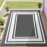 RURALITY vista frontal de la alfombra exterior mostrando diseño gris y blanco y protección