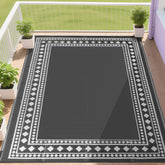RURALITY alfombra exterior frontal mostrando patrón gris y blanco y resistencia