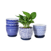 Selamica maceta frontal vintage azul mostrando acabado y forma, elegante en interiores