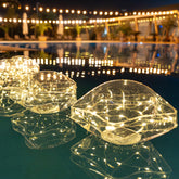 TIALLY estrella flotante frontal mostrando diseño y beneficio de iluminación cálida