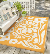 Uphome alfombra frontal naranja floral mostrando diseño y protección