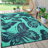 Uphome alfombra frontal teal mostrando diseño reversible y colores vibrantes