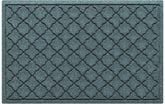 WaterHog alfombra frontal mostrando protección contra suciedad